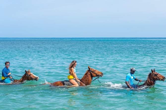 Andar a cavalo na praia