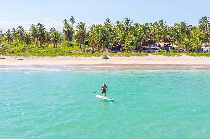 Turista curtindo praia de Maceió