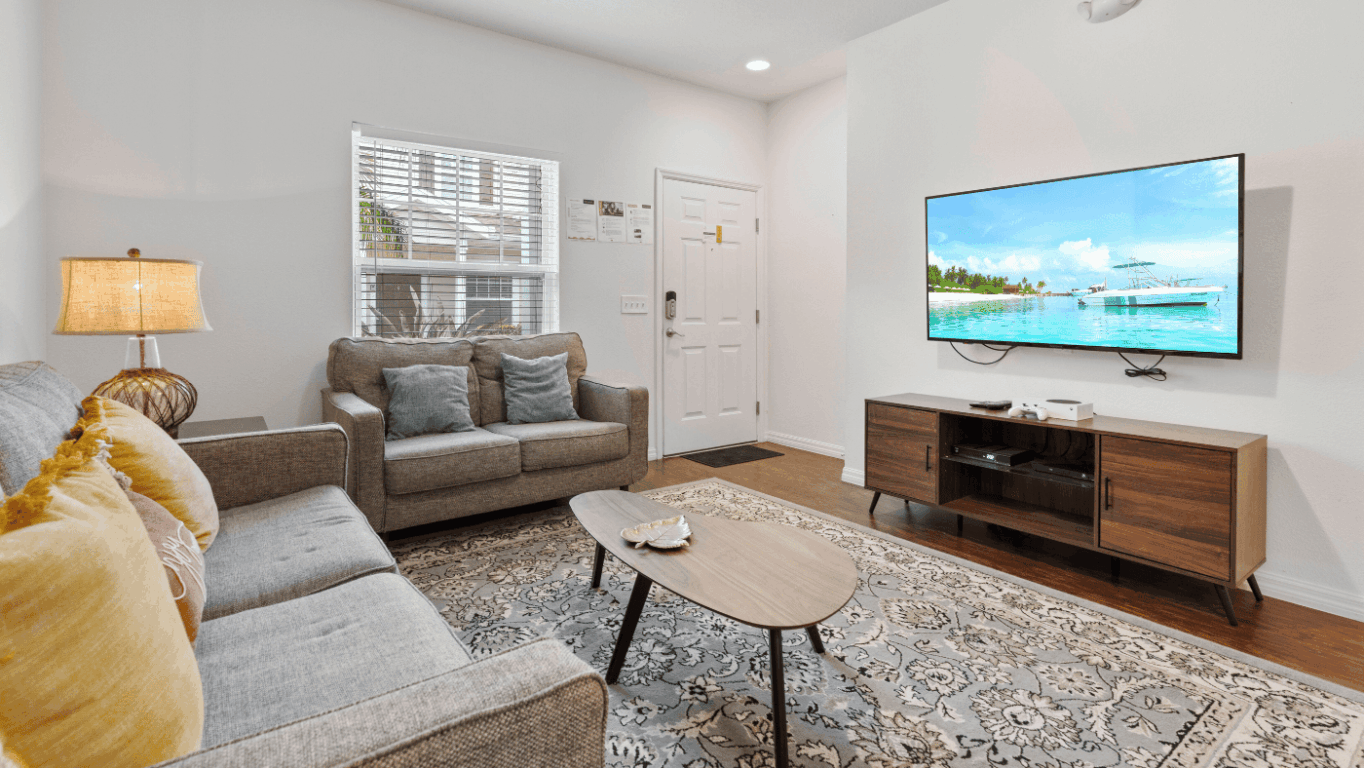 Sala de casa de 3 quartos no Lucaya Village Sala de casa de 3 quartos no Lucaya Village